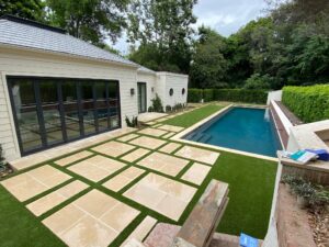 Residential backyard turf with brickwork